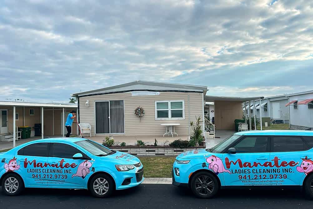 Manatee Ladies Cleaning branded cars parked in front of a home in Bradenton, FL
